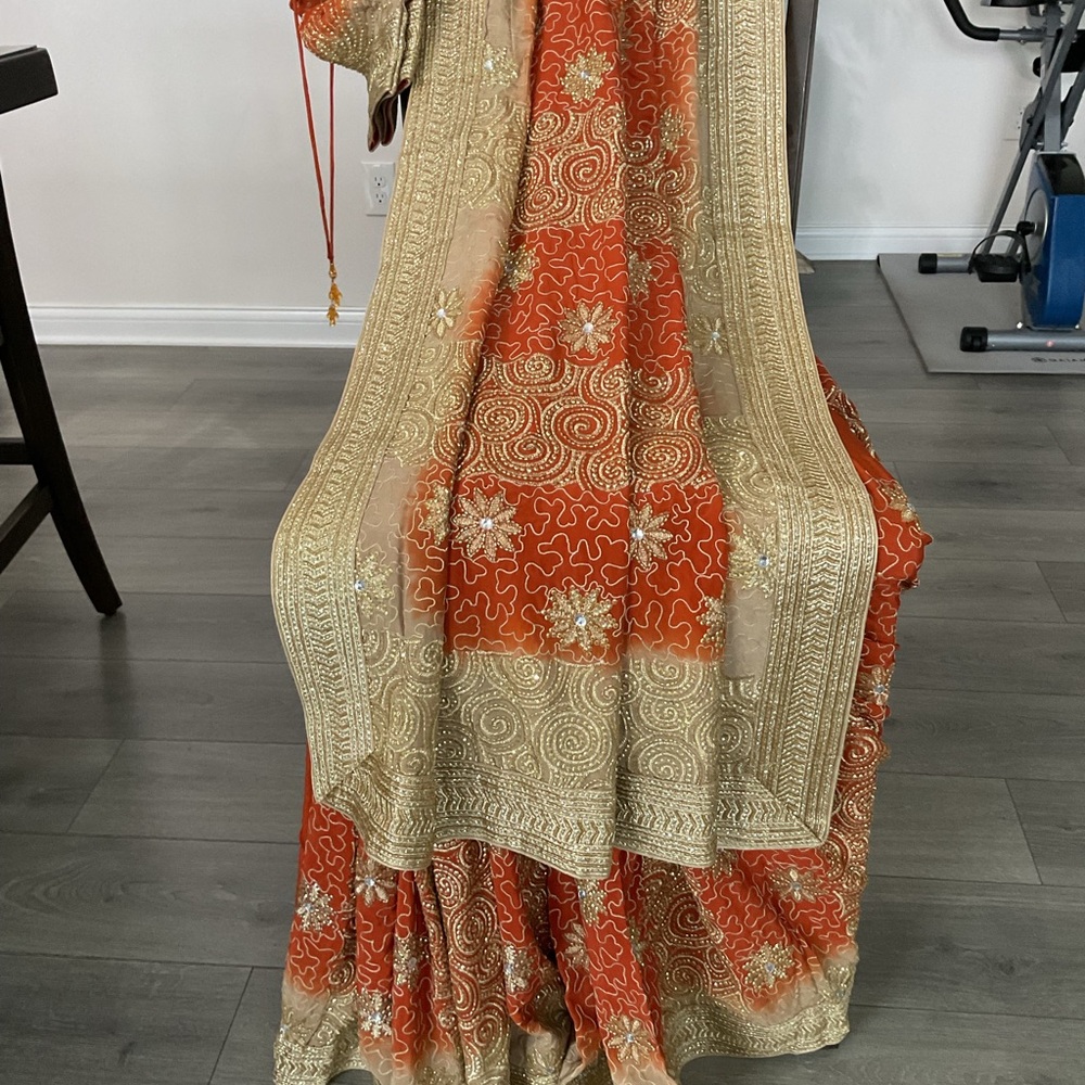 Elegant Orange and Gold Embroidered Women’s saree lehenga